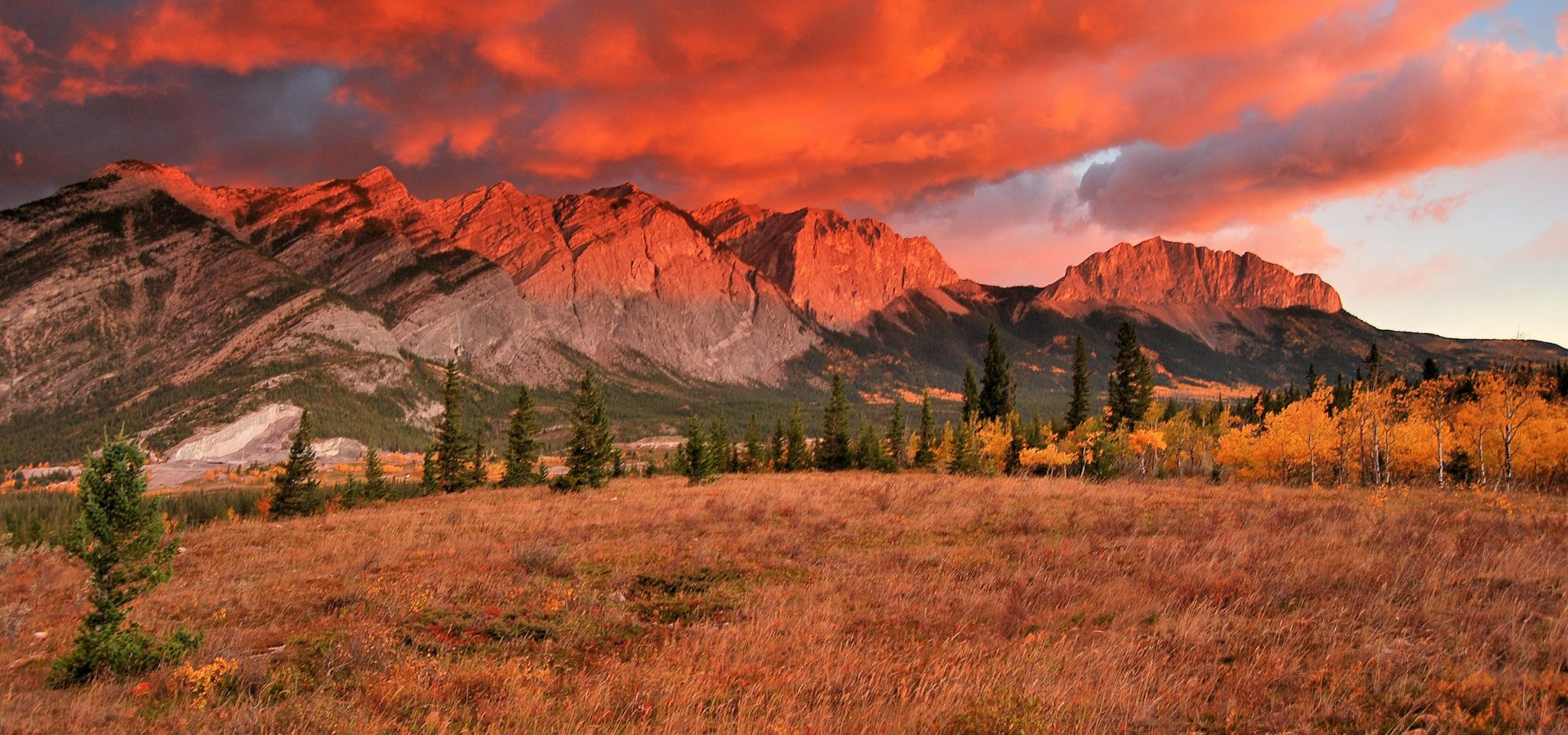 Alberta foothills and mountains glowing at sunset